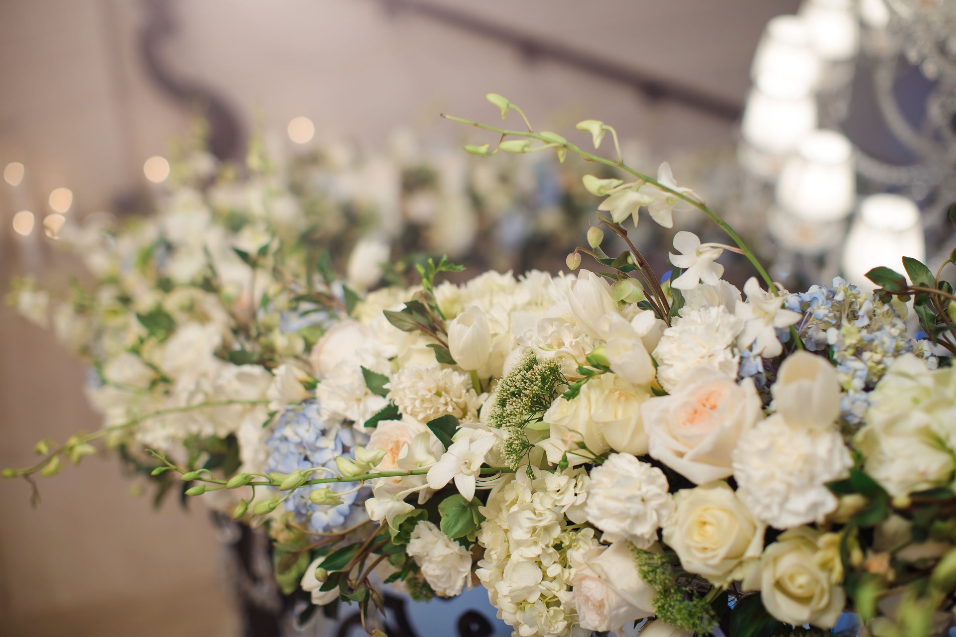 Exquisite White Floral Arrangements With Roses And Orchids